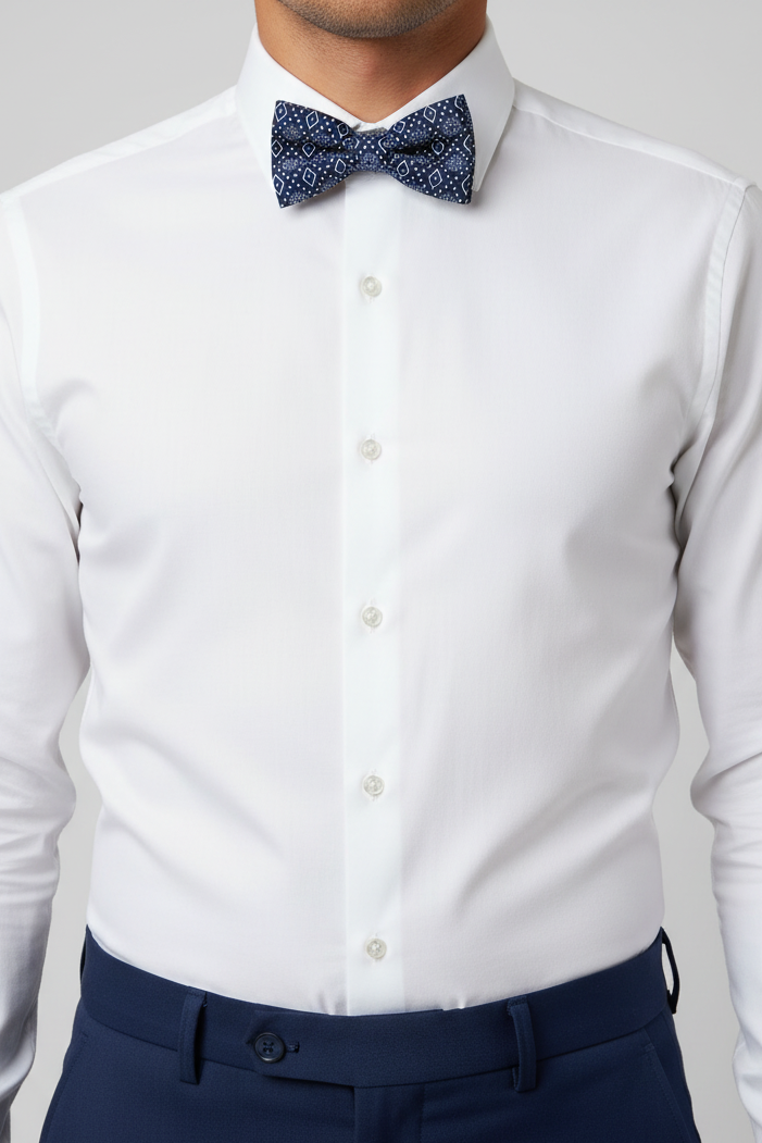 Navy blue bow tie with white geometric pattern on a white background