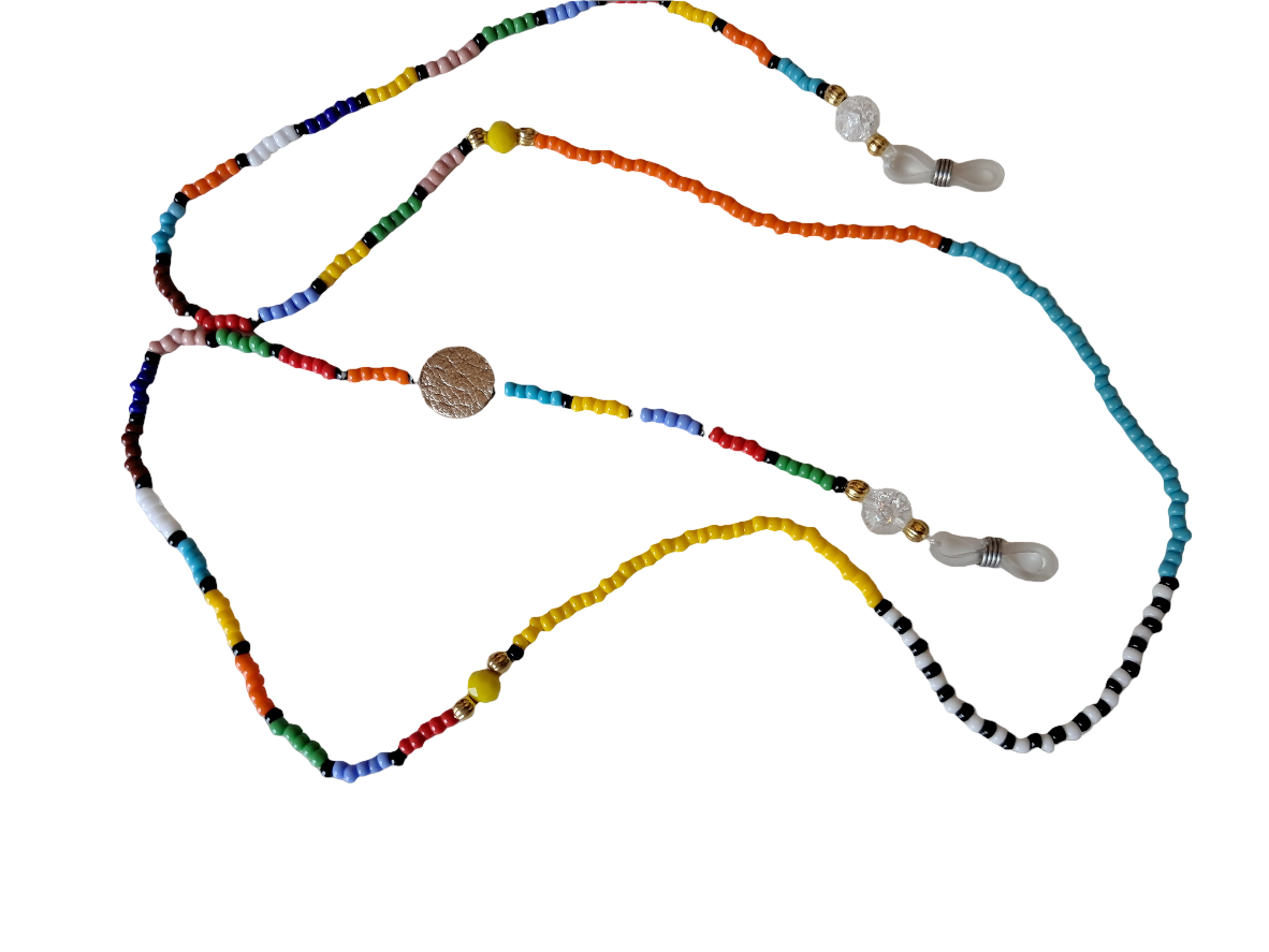 Colorful beaded necklace on a grey background